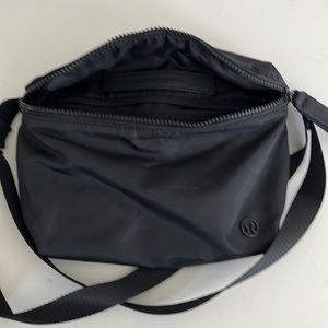 Excellent condition Lulu cross body pouch bag.